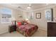 Comfortable bedroom featuring neutral walls, carpet, ceiling fan, and windows with natural light at 11241 Golden Chestnut Pl, Las Vegas, NV 89135