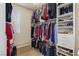 Walk-in closet with ample storage, including shelves, hanging racks, and drawers at 11241 Golden Chestnut Pl, Las Vegas, NV 89135