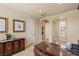 Well-appointed home office featuring a large desk, built-in cabinets, and neutral paint at 11241 Golden Chestnut Pl, Las Vegas, NV 89135