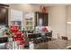 Bright kitchen featuring granite countertops and dark cabinetry at 11241 Golden Chestnut Pl, Las Vegas, NV 89135