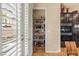 Well-stocked pantry with ample shelving, providing excellent storage space near the kitchen at 11241 Golden Chestnut Pl, Las Vegas, NV 89135
