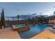 Beautiful pool and spa area with ambient lighting, creating a serene and relaxing atmosphere at 11241 Golden Chestnut Pl, Las Vegas, NV 89135