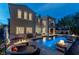 Luxury backyard with a pool, hot tub, fire features, and patio seating for entertaining at 11241 Golden Chestnut Pl, Las Vegas, NV 89135