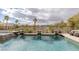 Beautiful pool with water features, desert landscaping and mountain views at 11241 Golden Chestnut Pl, Las Vegas, NV 89135