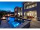 Stunning backyard view of the pool and hot tub and outdoor seating at 11241 Golden Chestnut Pl, Las Vegas, NV 89135