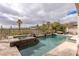 Luxury pool and spa combination with desert landscape and mountain views at 11241 Golden Chestnut Pl, Las Vegas, NV 89135
