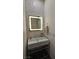 Powder room features sleek vanity and contemporary mirror at 11660 Intervale Rd, Las Vegas, NV 89135
