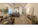 Dining room with a large table, stylish chairs, modern mirror, and lots of room for entertaining at 11660 Intervale Rd, Las Vegas, NV 89135