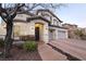 Charming two-story home with a well-maintained front yard, two car garage, and inviting entryway at 11660 Intervale Rd, Las Vegas, NV 89135