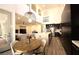Bright living area with modern kitchen and dining area, perfect for entertaining at 11660 Intervale Rd, Las Vegas, NV 89135