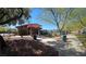Community pool with shaded area, lounge chairs, and restrooms at 11660 Intervale Rd, Las Vegas, NV 89135