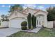 A single Gathering home with a well manicured yard and two car garage at 1229 Triumph Ct, Las Vegas, NV 89117