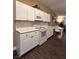 Bright kitchen with white cabinets, an eat-in dining area, and stainless steel appliances at 1608 Joshua Tree Ct, Las Vegas, NV 89108