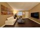 Bright living room with stylish furniture, a large TV, and contemporary decor elements at 1608 Joshua Tree Ct, Las Vegas, NV 89108