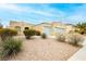 Attractive one-story home featuring low-maintenance landscaping and a charming facade in a sunny locale at 187 Golden Crown Ave, Henderson, NV 89002