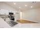 A well-lit kitchen features white cabinets, stainless steel appliances, and a modern faucet at 187 Golden Crown Ave, Henderson, NV 89002
