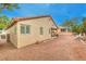 Low maintenance backyard featuring a covered patio and lush greenery, perfect for outdoor living at 1970 Jasper Creek Pl, Las Vegas, NV 89123
