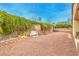 This low maintenance backyard has greenery covered walls and a bench at 1970 Jasper Creek Pl, Las Vegas, NV 89123