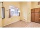 Sunlit breakfast nook features tile flooring and charming window views at 1970 Jasper Creek Pl, Las Vegas, NV 89123