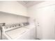 This laundry room contains a washer and dryer at 1970 Jasper Creek Pl, Las Vegas, NV 89123