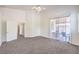 Bright main bedroom with sliding door access to the covered patio at 1970 Jasper Creek Pl, Las Vegas, NV 89123