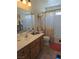 Well-lit bathroom with modern fixtures, a vanity, and a shower-tub combination at 2012 Nightrider Dr, Las Vegas, NV 89134