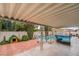 Inviting backyard area featuring a covered patio and a refreshing pool at 213 Red Coral Dr, Henderson, NV 89002