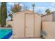 Practical backyard shed with easy pool access and ample storage space at 213 Red Coral Dr, Henderson, NV 89002
