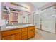 Bathroom with dual sinks, tile flooring and shower tub combo at 213 Red Coral Dr, Henderson, NV 89002