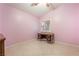 Bedroom with tile flooring, shuttered windows and small desk at 213 Red Coral Dr, Henderson, NV 89002