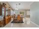 Dining room area with tile floors, natural light, and access to the backyard at 213 Red Coral Dr, Henderson, NV 89002