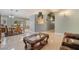 Open-concept living area with tile flooring and views of the dining area at 213 Red Coral Dr, Henderson, NV 89002