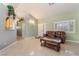 Open-concept living area featuring tile flooring and view to entry at 213 Red Coral Dr, Henderson, NV 89002