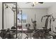 Dedicated exercise room with workout equipment and abundant natural light from the window at 2271 Zephyr Ave, Pahrump, NV 89048