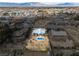 Expansive aerial shot of the real estate, displaying the property's large lot, pool, and desert surroundings at 2281 Wagon Ave, Pahrump, NV 89048