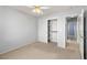 Comfortable bedroom with carpet floors, ceiling fan, and closet storage at 2281 Wagon Ave, Pahrump, NV 89048