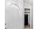 Clean foyer featuring a decorative front door, adjacent closet, and neutral decor at 2281 Wagon Ave, Pahrump, NV 89048