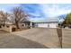 Attractive home with a spacious driveway and a three-car garage, perfect for a growing Gathering at 2281 Wagon Ave, Pahrump, NV 89048