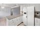 Charming kitchen featuring granite counters and white appliances at 2281 Wagon Ave, Pahrump, NV 89048