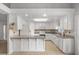 Modern kitchen features white cabinetry, granite countertops, and stainless steel appliances at 2281 Wagon Ave, Pahrump, NV 89048
