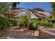 A community common area with umbrella providing shade, perfect for relaxing and enjoying the outdoors at 231 W Horizon Ridge Pkwy # 426, Henderson, NV 89012