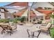 Outdoor lounge with comfortable seating under a large shade structure, perfect for socializing and relaxing at 231 W Horizon Ridge Pkwy # 426, Henderson, NV 89012