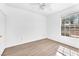 This light and bright bedroom has nice hardwood flooring and a window at 231 W Horizon Ridge Pkwy # 812, Henderson, NV 89012