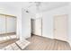 A bright bedroom with a double door closet and light hardwood floors at 231 W Horizon Ridge Pkwy # 812, Henderson, NV 89012