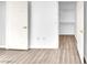 Walk-in closet with storage shelving and new light-colored flooring at 231 W Horizon Ridge Pkwy # 812, Henderson, NV 89012