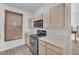 Cozy kitchen with sleek black oven, microwave, and wood-toned cabinets for a modern look at 231 W Horizon Ridge Pkwy # 812, Henderson, NV 89012