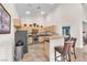 Eat-in kitchen featuring stainless steel appliances, tiled floors, and high ceilings at 231 W Horizon Ridge Pkwy # 812, Henderson, NV 89012