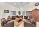 Community living room featuring comfortable couches, chairs, and a coffee table at 231 W Horizon Ridge Pkwy # 812, Henderson, NV 89012