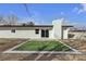 Backyard featuring desert landscaping, a modern patio, and a sliding glass door at 2837 Reynolds Ave, North Las Vegas, NV 89030