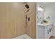 Updated modern bathroom featuring new fixtures, tile and a large walk in shower at 2837 Reynolds Ave, North Las Vegas, NV 89030